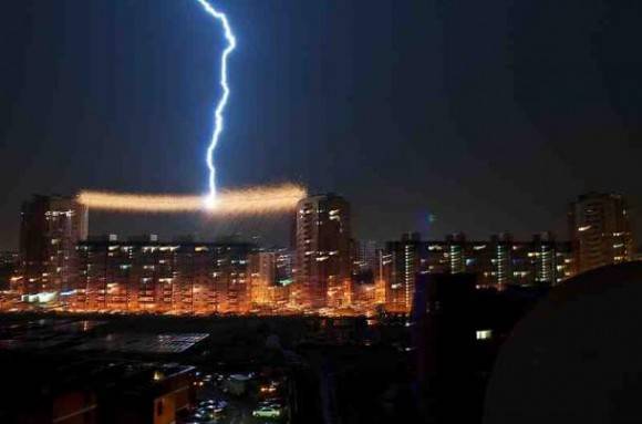 Lightning striking a power cable.