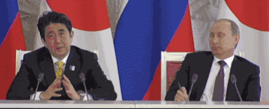 Vladimir Putin is bored during a conference