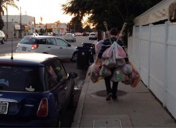 He’s determined to take all those groceries in one trip...like really determined.