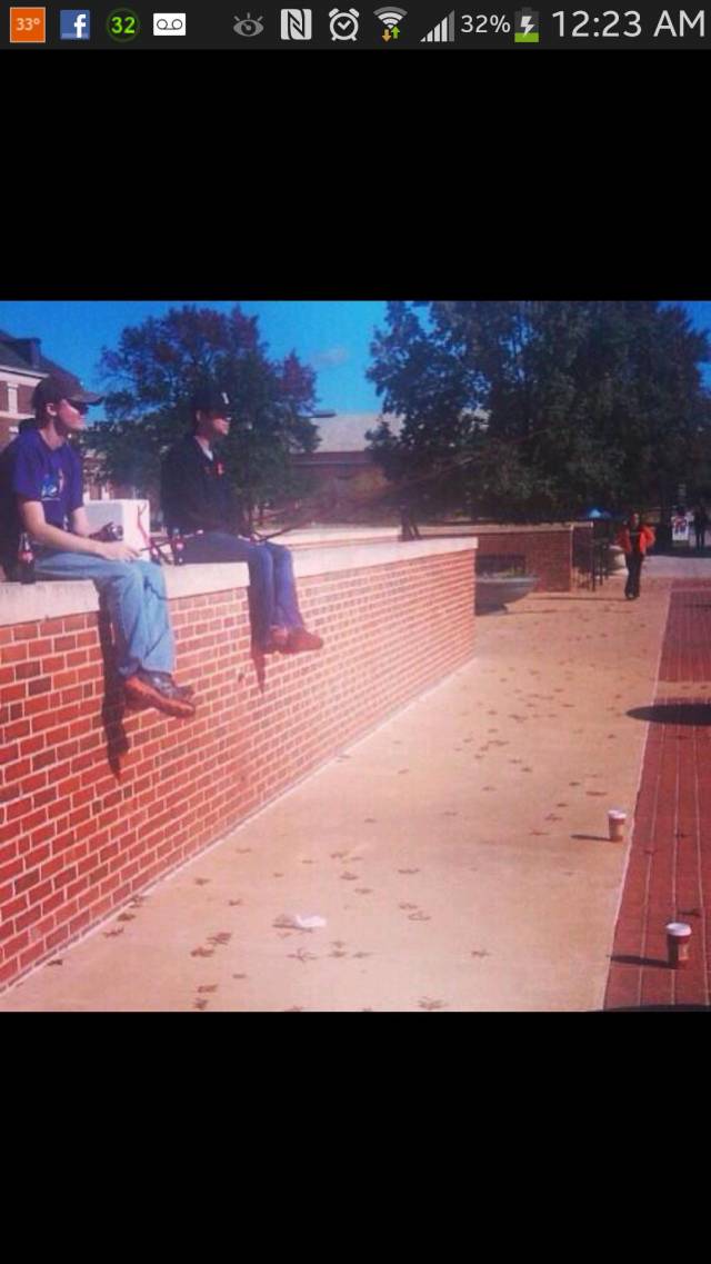 These two were sitting on campus with pumpkin spice lattes on the end of fishing poles saying they were 