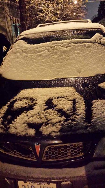 My engine’s heat pattern makes a panda on my hood when it snows