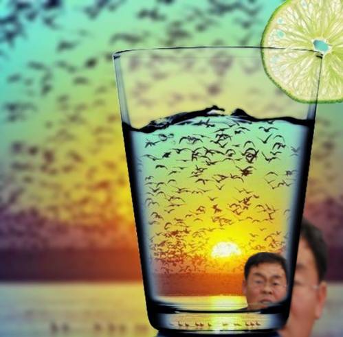I also tried to take a photo of the sunset through a glass....