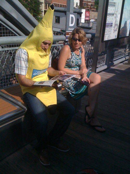 Woman waiting on train platform (banana for scale)