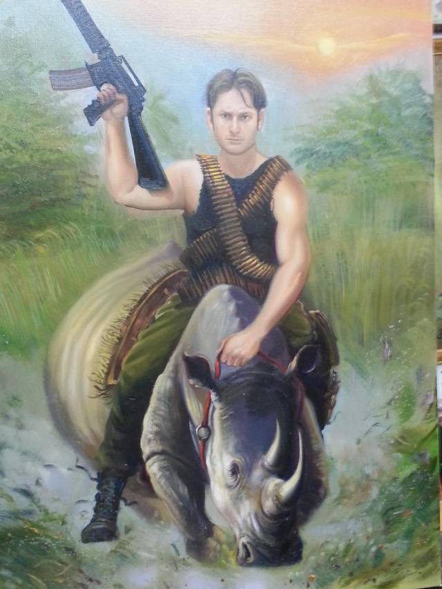 While intoxicated in Thailand I had a guy paint me shooting an m-16 while riding a rhino. Possibly the best investment I've ever made!