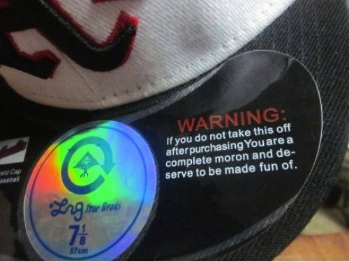 Warning tag on a hat.