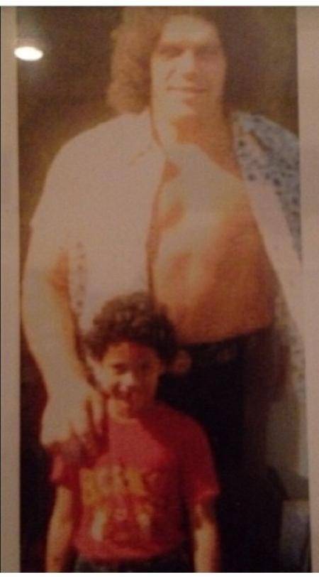 The Rock at age 5 with Andre the Giant