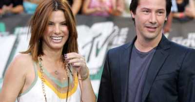 Keanu Reeves Brought Sandra Bullock Champagne And Truffles Because She Mentioned She’d Never Had Them