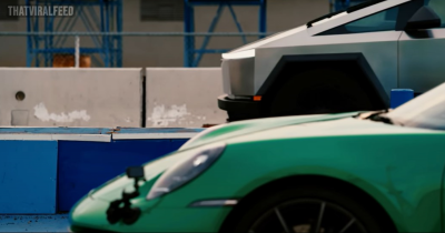 Watch The Tesla Cybertruck Beat A Porsche 911 In A Drag Race While Towing A 911
