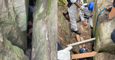 Australian Woman Gets Stuck Upside Down Between Massive Rocks While Trying To Retrieve Her Dropped iPhone