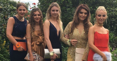 Student Goes Viral For Sneaking A Massive Flask Into Prom Disguised As A Clutch Bag