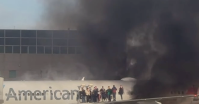 American Airlines Jet Bursts Into Flames In Denver, Forcing Emergency Evacuation