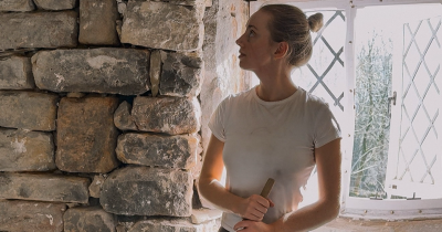 Woman Horrified After Uncovering Eerie Items Hidden In Her Home's Wall, Leading To Chilling Revelation